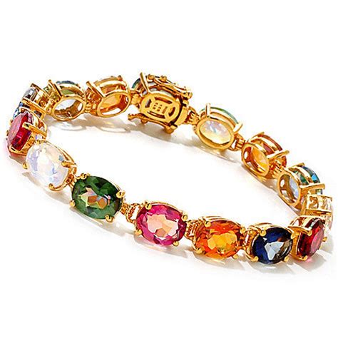 Women's gold bracelets with gemstone .